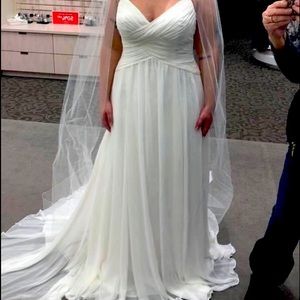 NEVER WORN: Wedding dress from David’s bridal